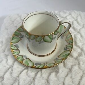 TF& S LTD, DEMITASSE CUP AND SAUCER